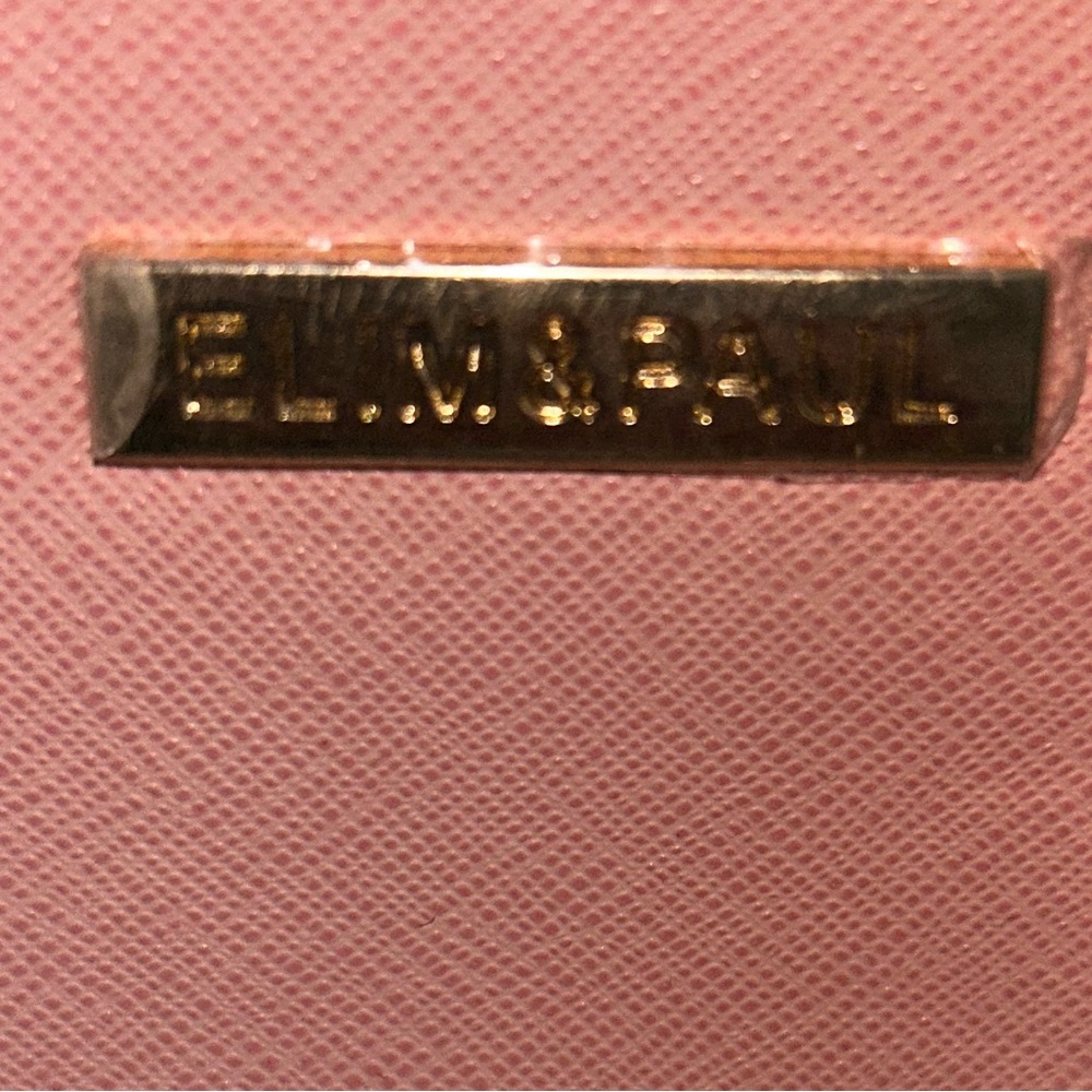 Beautiful purse with wallet and clutch new also has dust bag included.